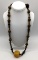 Vintage Asian metal, wood and resin bead necklace. Approx 18 inches.