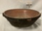 Large antique dark two-handled earthenware bowl, approx. 18x15x5 inches.