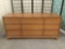 Mid century BP John 9 drawer low boy dresser. Made in Portland. Approx 64x30x18 inches.