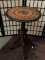 Vintage German smoking table with ceramic casters. Approx 18x18x28 inches.