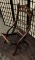 Antique wooden folding chair missing cushion. Approx 35x18x20 inches.