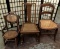 Lot of 3 vintage rattan wooden chairs. Largest approx 32x27x16 inches