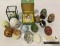 14 eggs of various compositions. Alabaster, crystal, china, abalone and more. Approx 3.5x2.5x2.5 in.