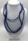 Collection of three strands of 1930s Czech blue glass African trade beads. Longest approx 24 inches.