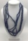 Collection of four strands of antique Czech blue glass African trade beads. Longest approx 24 inches