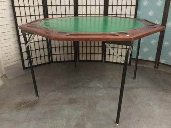Wood & vinyl collapsible poker table, some minor wear on vinyl, see pics. Approx. 49x49x31 inches.