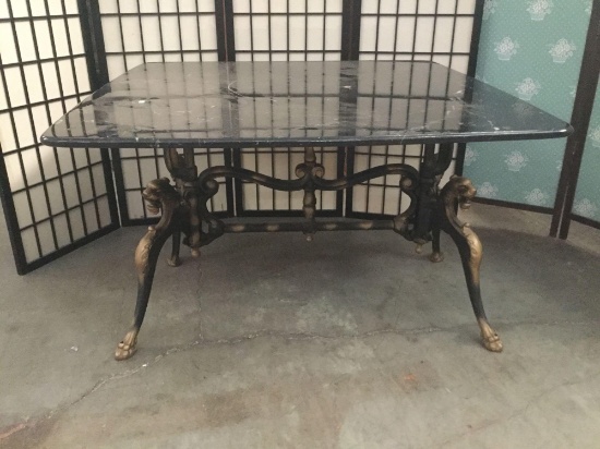 Vintage metal dragon table stand with marble top. Approx 39x39x24 inches.