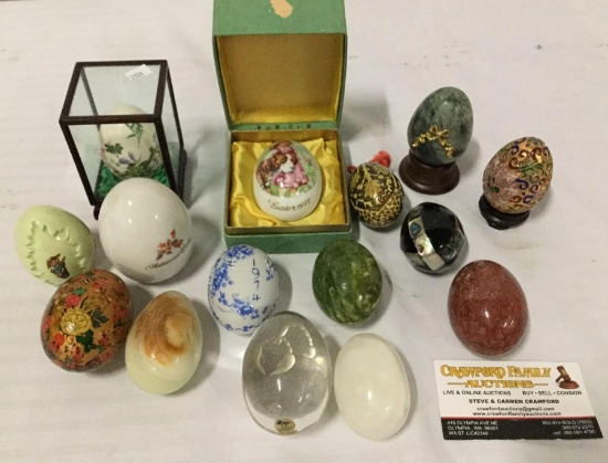 14 eggs of various compositions. Alabaster, crystal, china, abalone and more. Approx 3.5x2.5x2.5 in.