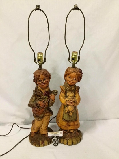 Pair of plaster House of Lamps lamps w/ children with cat & guitar design. Tested/working. No shades