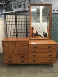 Seven-drawer wood dresser w/vanity mirror, sold as is. Approx. 6x23x37 inches.