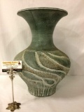 Vintage green ceramic vase w/ swirling incised designs, approx. 13x13x18.5 inches.
