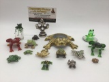 15 small decorative frog figurines & trinkets, largest approx. 2.5x2x1 inches.