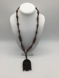 Vintage wood carved African human face pendant with bead necklace w/ millefiori trade beads 17x2 in.