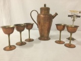 Copper pot/pitcher w/lid & five copper goblets, largest approx. 9x5x11 inches.