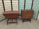 Pair of vintage wood drop leaf tables. Largest approx 43x29x24 inches.