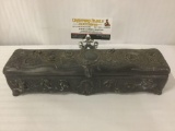 Ornate black metal vintage box marked Commencement J.W.H - w/floral pattern. Approx. 12x3x3 inches.