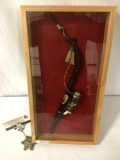 Black opium pipe w/ image of a hunter on bowl piece, comes in a display case, approx. 11x21x2 inches