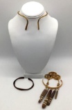 Lot of 3 traditional Asian jewelry pieces. Brass neck cuff, copper cuff bracelet, and stone pendant