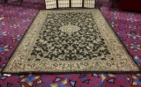 Mohawk Home wool carpet in kerman/jet black w/floral designs, approx. 120x80 inches.
