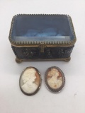 Pair of authentic Antique shell cameo brooches and jewelry box. One brooch is marked .800 silver.