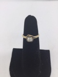 14k gold size 6 ring with approx 0.5 carat diamond. The band is gold, but setting is not. Ttw 2.5g.