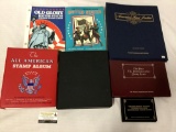 Collection of vintage full and partially filled American stamps books. Largest approx 14x12.5 inches