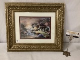 Rare framed Thomas Kinkade print of small church by stream, approx 20 x 17 inches.