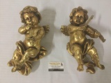 Hanging gold painted set of cherubs playing instruments, approx.