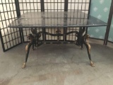 Vintage metal dragon table stand with marble top. Approx 39x39x24 inches.