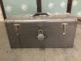 Vintage metal Craftsman tool box filled with hardware.