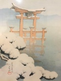 Framed Asian print of a Torii/Pailou arch scene, approx. 23x22x2.75 inches.