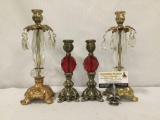 Two pairs of vintage metal and plastic candle holders. Largest approx 12x5x5 inches.