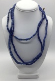 Collection of three strands of 1930s Czech blue glass African trade beads. Longest approx 24 inches.