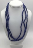 Collection of three strands of 1930s Czech blue glass African trade beads. Longest approx 24 inches.