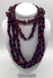 Long strand of vintage red bohemian glass trade beads and 3 strands of vintage glass trade beads