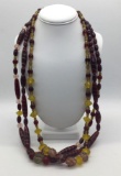 Three strands of Indian trade beads and one antique Czech glass bead. Longest approx 34 inches.