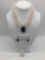Three strand white Akoya style pearl necklace with matching earrings.