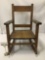 Vintage childrens wooden rocking chair, w/some wear, see pics, approx. 26x23x15 inches.