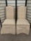 Pair of cushioned/upholstered dining chairs w/studs. Approx. 19x23x42 inches each.