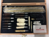 Winchester rifle cleaning set in wood case. approx 12x8x2 inches.