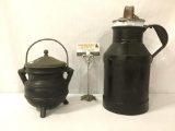 2 vintage metal pieces: jug w/chained lid, metal cauldron w/lid & handle. Largest approx 9x7x15 in.