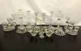 18 vintage glass candle holders. Tallest approx 8x4x4 inches.
