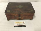 Vintage brass and wood jewelry box. Approx 9x6.5x3.5 inches.