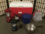 Cooler full of 6 camping items, incl. 2 Coleman lanterns (5312 & 5310), water sack, & more.