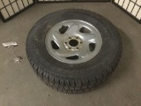 Cooper Discover M+S Snow Groove 103S 235/70R15 tire w/six lug nut holes.