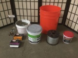 Two buckets filled w/ nails, screws, wire, grout, pre-mixed mortar, & more.