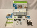 HP Photosmart 7850 color printer, w/all requisite chords, manuals, cd & box. Tested/turns on.