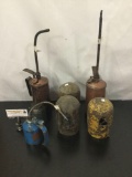 Collection of four oil cans and three other pieces. Golden rod, indair, and more.
