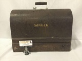 Vintage Singer sewing machine. Case won?t open.