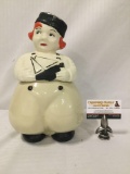 Vintage red headed girl in pill box hat cookie jar.